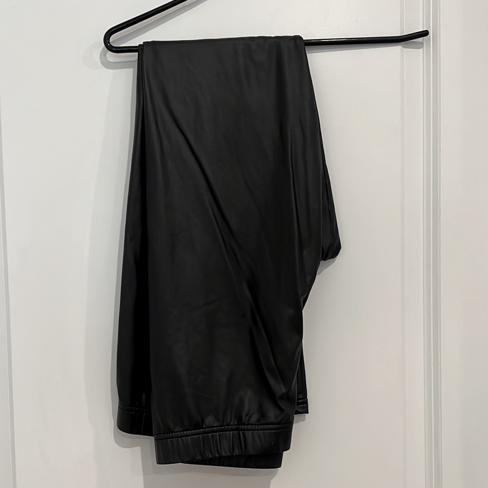 Lightly worn pleather leggings.